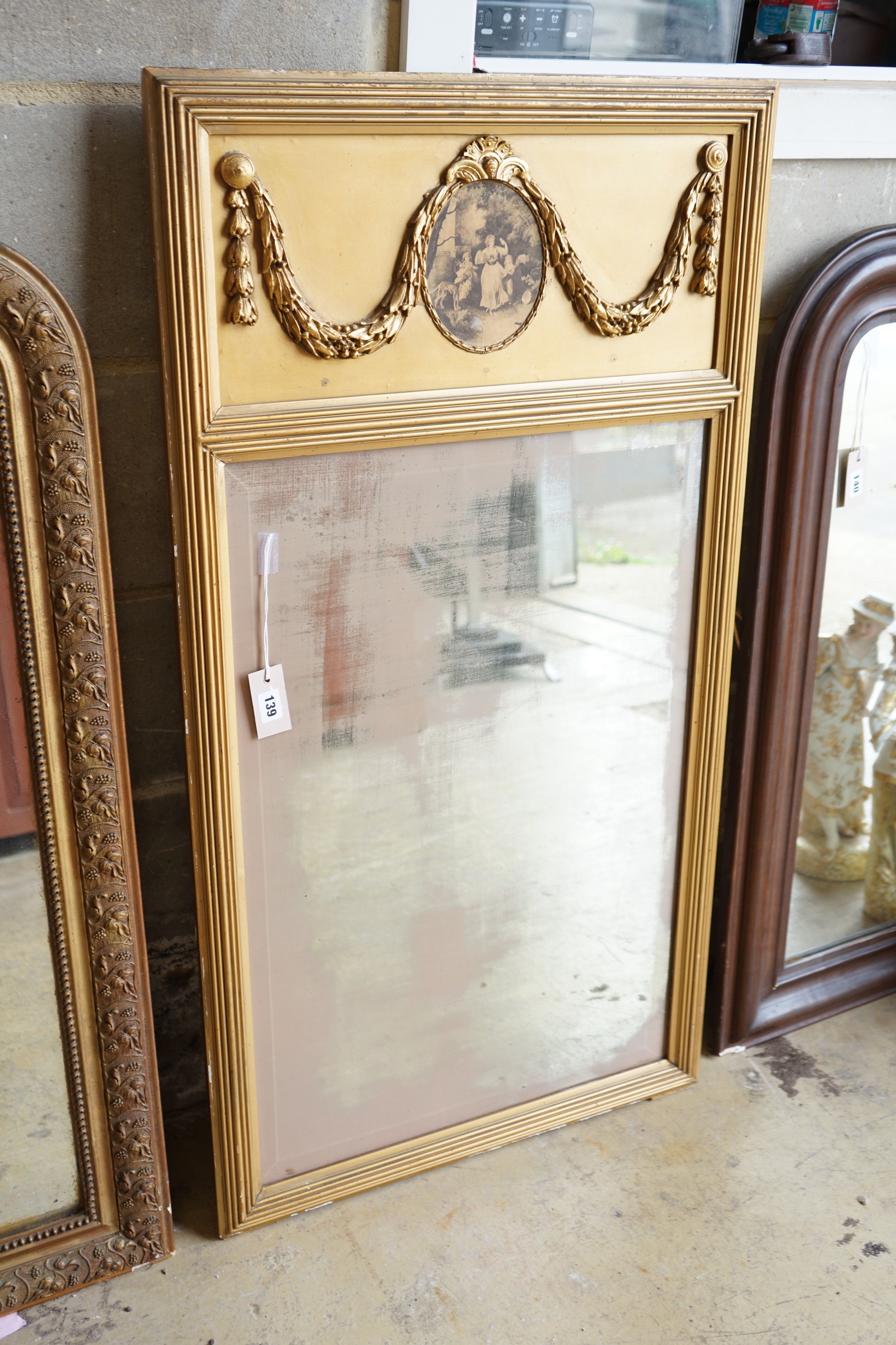 An 18th century style giltwood and gesso Trumeau mirror, width 63cm, height 119cm